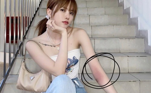 Tay ửng đỏ , Thiều Bảo Trâm khiến cộng đồng mạng chú ý vì xóa hình xăm